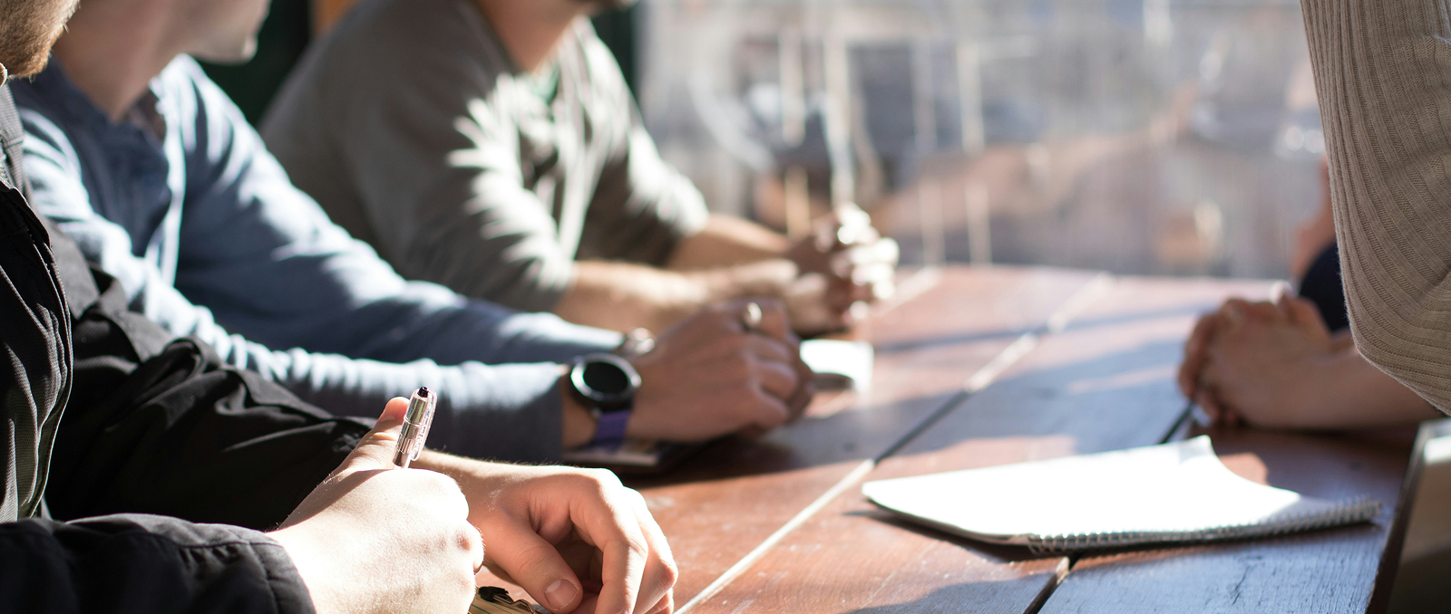 People signing table
